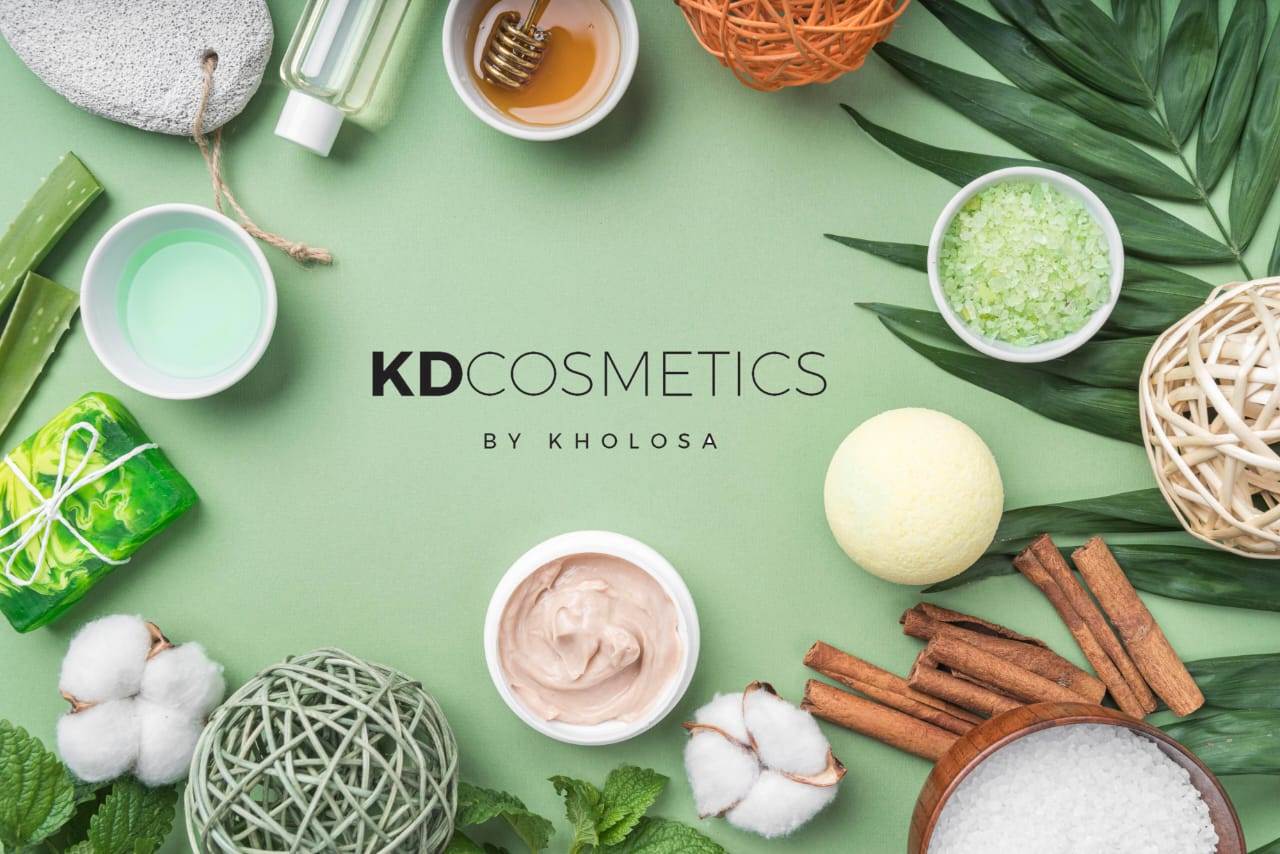 Natural cosmetic ingredients including aloe vera, honey, botanicals and organic skincare products on a green background